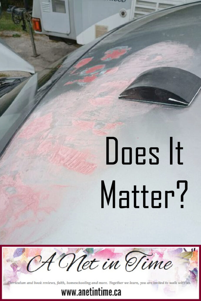 Does it matter? text over image of body work on silver car