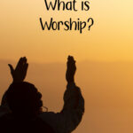 What is Worship text: what is worship image: person standing against sunlight sky with hands upraised