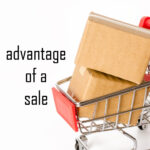 picture of shopping cart with gifts, text advantage of a sale