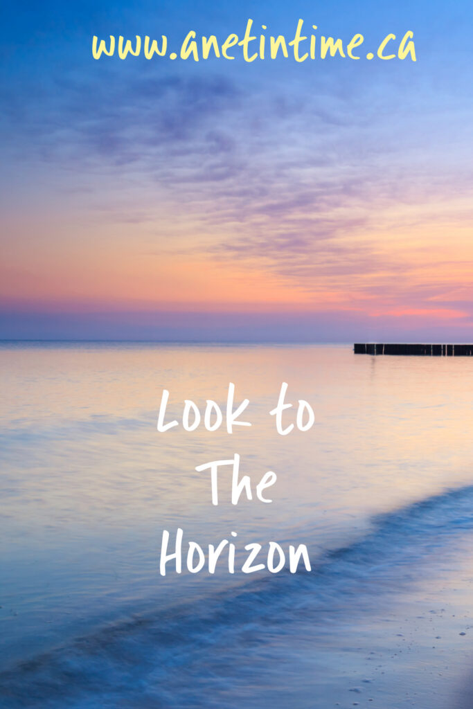 image of a beach front horizon with peach and blue in the sky.  Text Look to the Horizon
