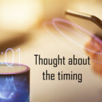text: thought about the timing. image of clock with floating universe
