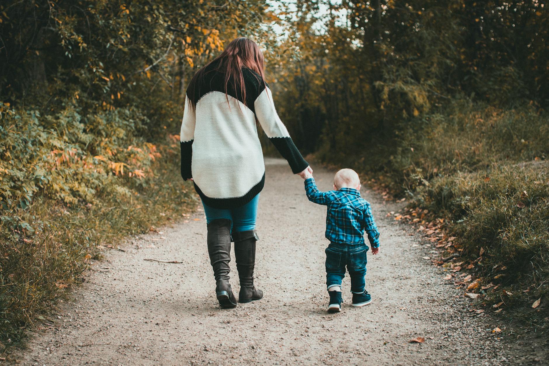 mother walking with baby son