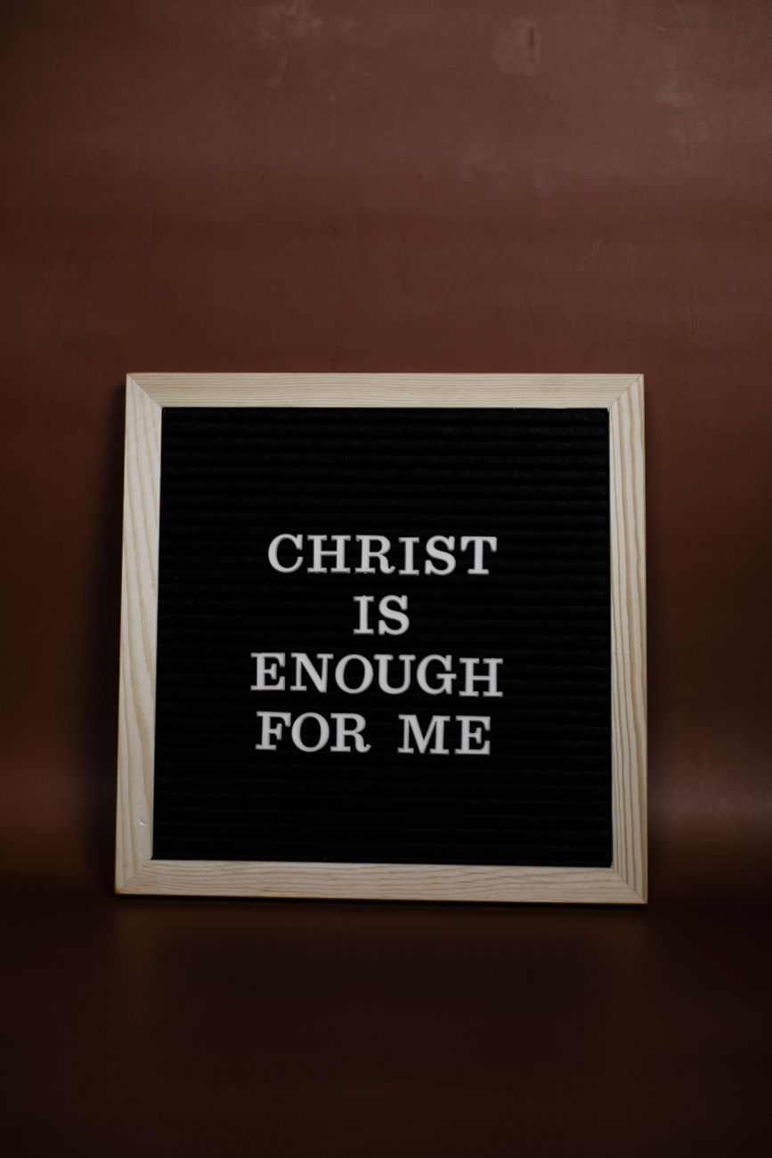 christ is enough for me text on brown background
