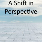 text a shift in perspective image of brick sidewalk against blue sky